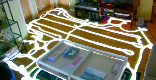 A long-exposure photograph showing the human-recognizable path used by a Neato Robotics XV-11 to clean a room (Photo: <a href="http://www.gearfuse.com/robotic-vacuum-paths-mapped-and-compared-with-long-exposure-pictures/">Gearfuse</a>)